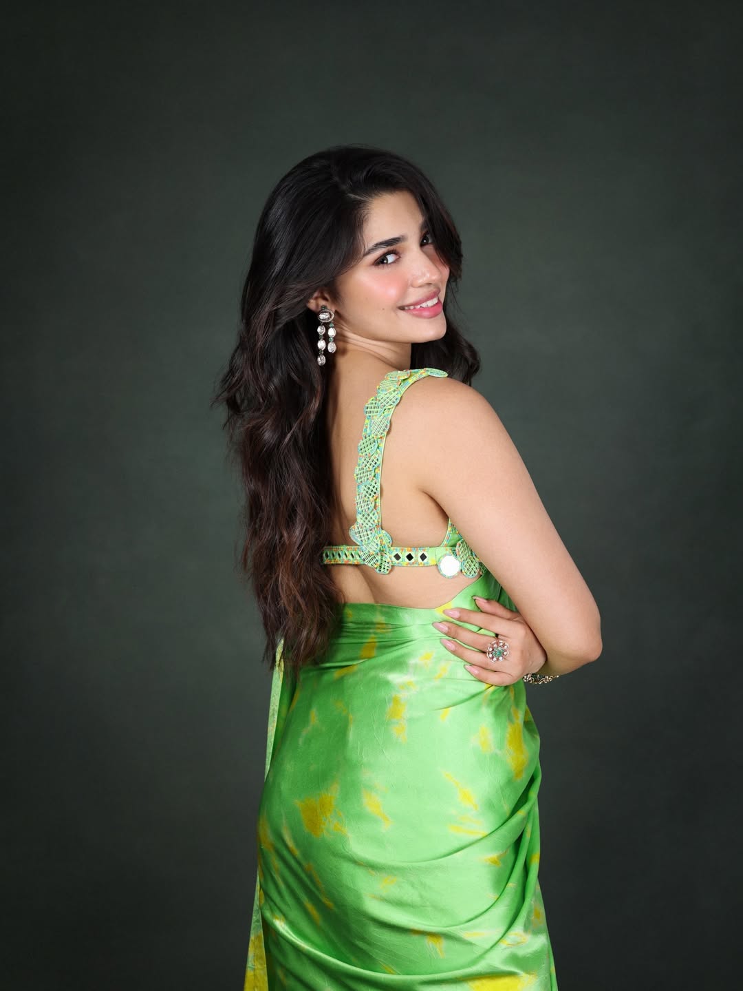 Krithi Shetty | చిలక పచ్చ చీరలో కృతి శెట్టి అందాల విందు - Image 2