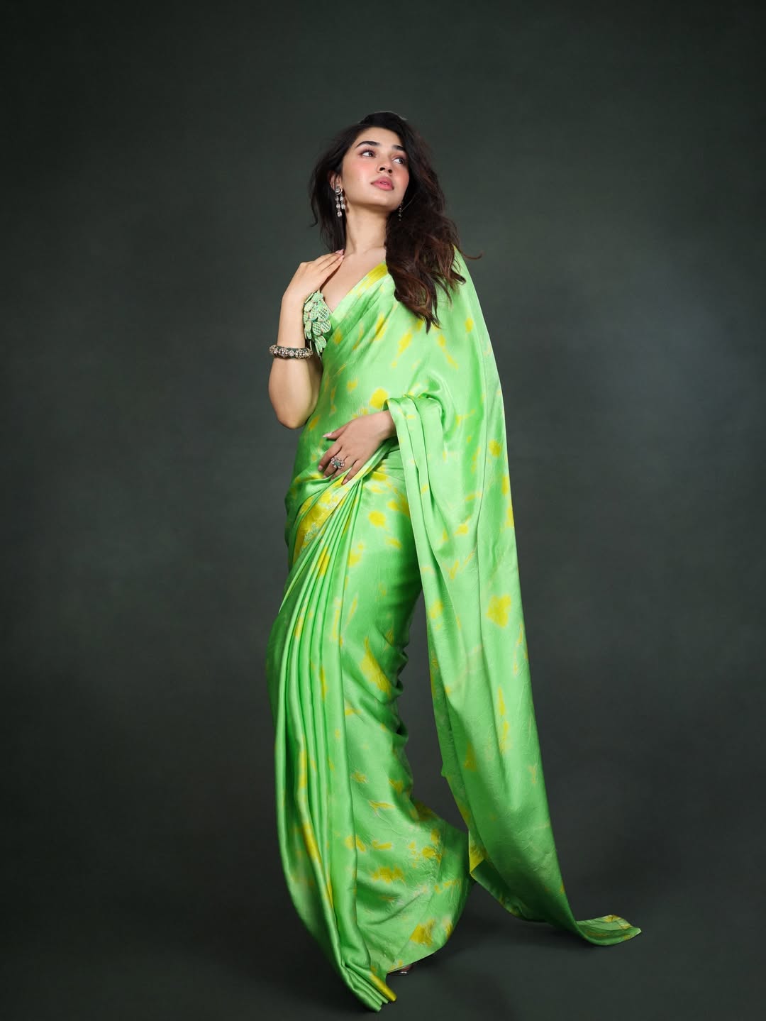 Krithi Shetty | చిలక పచ్చ చీరలో కృతి శెట్టి అందాల విందు - Image 5